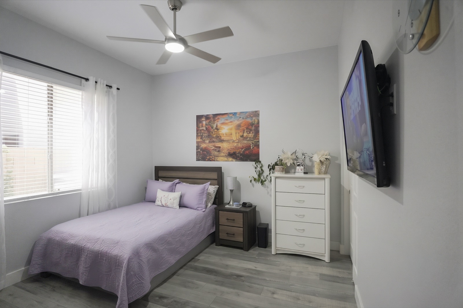 A calm bedroom with gentle lavender tones
